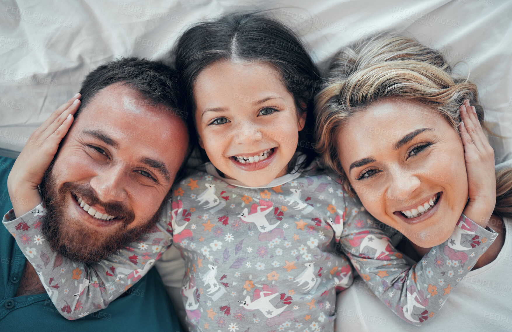 Buy stock photo Top view, happy and portrait of family in bedroom with smile, for love and relax together in home. Mom, dad or support for kid and excited for new house, wellness and care in morning or apartment