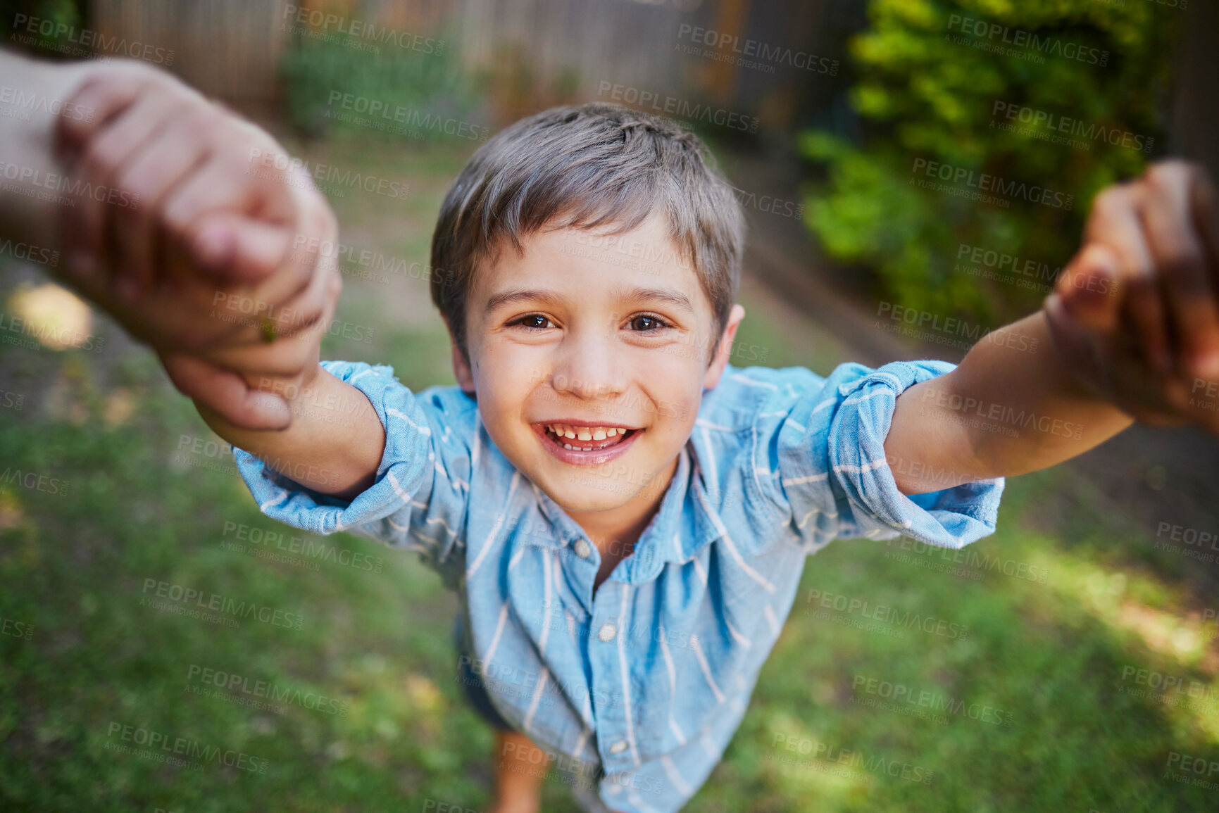 Buy stock photo Son, spinning and parents hands in garden, smile portrait and kid for childhood fun in summer for weekend break. Game, bonding and pov with happiness motion, backyard and together in sunshine