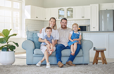 Buy stock photo Smile, portrait and family relax on sofa house for bonding, love and care or hug in living room together. Happy, woman and man with children for childhood, support and trust of memory at home