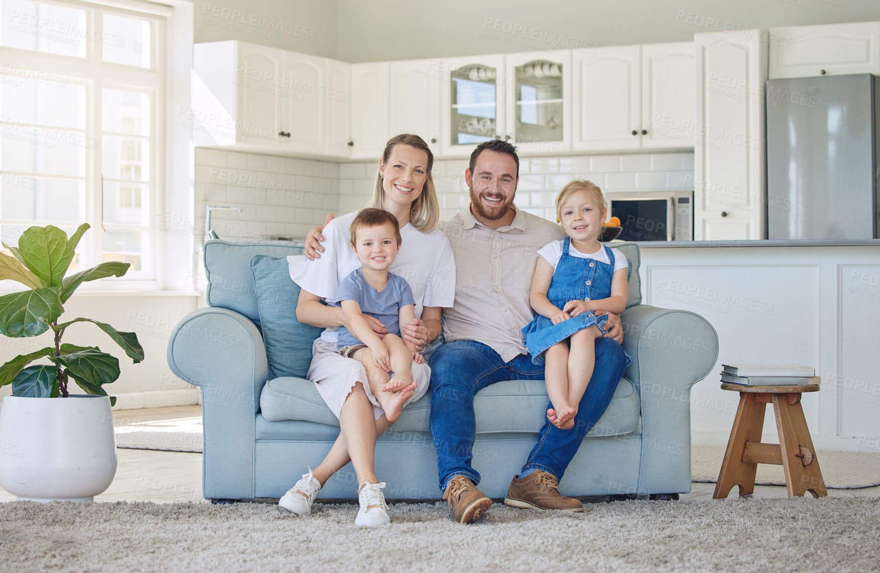 Buy stock photo Smile, portrait and family relax on sofa house for bonding, love and care or hug in living room together. Happy, woman and man with children for childhood, support and trust of memory at home