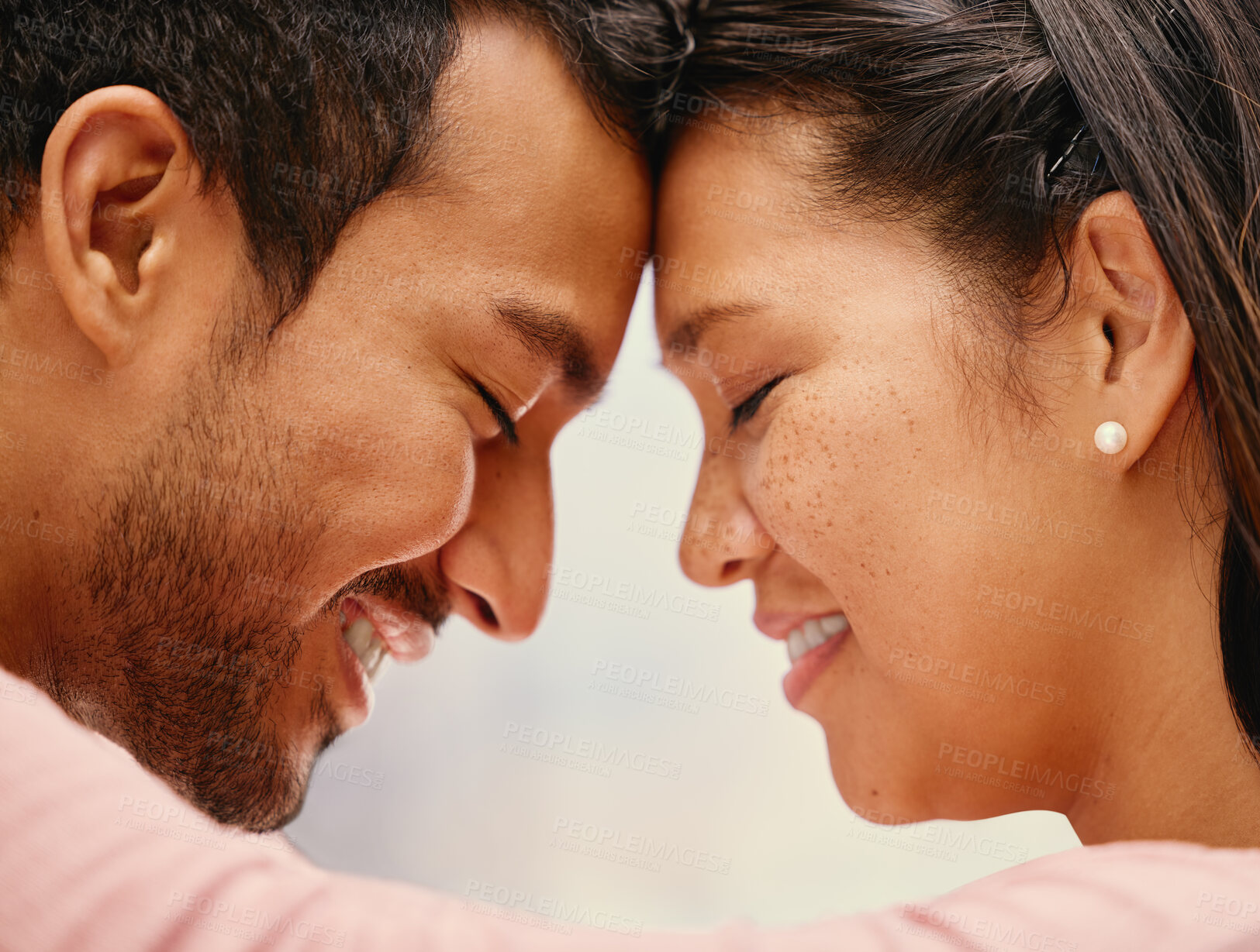 Closeup of mixed race man loving his asian wife. Headshot of hispanic  couple bonding and sharing an intimate moment at home. Beautiful woman with  freckles feeling in love with boyfriend | Buy