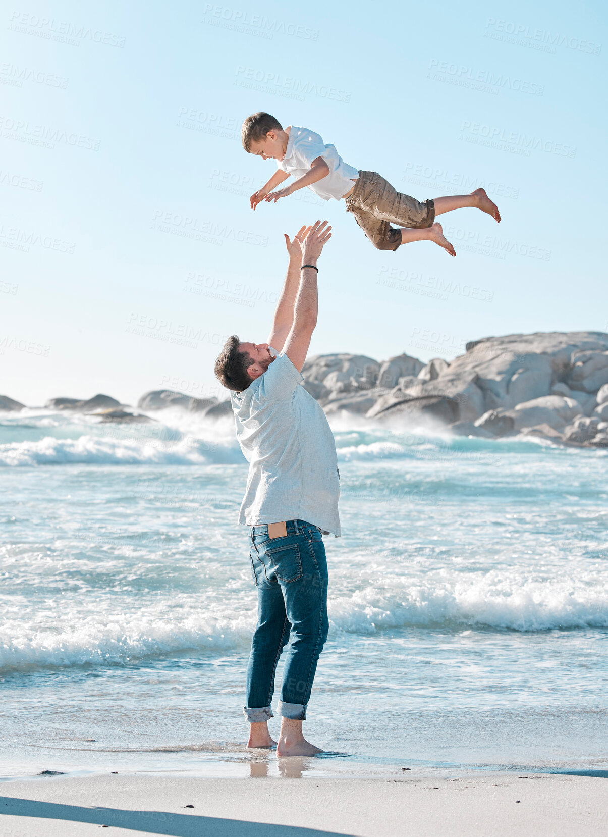 Buy stock photo Beach, playing and father with child in air for holiday, vacation and adventure in nature. Family, summer and dad throw boy by ocean for bonding, relationship and fun outdoors by seaside to relax