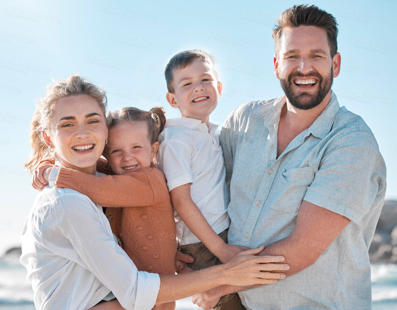 Buy stock photo Beach, happy  family and portrait of parents with kids for holiday, vacation and adventure. Nature, travel and mom, dad and children by ocean for bonding, relationship and fun by seaside to relax