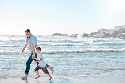 Buy stock photo Beach, dad and kid holding hands on walk for holiday adventure together on tropical island with waves. Nature, father and boy child on ocean vacation with travel, fun and happy bonding in Australia