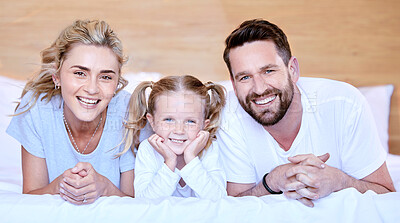 Buy stock photo Bedroom, happy and portrait of parents with child for relax, resting and comfortable in morning. Family, home and mother, father and girl in blanket for bonding, relationship and love on weekend