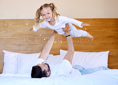 Buy stock photo Dad, airplane and girl for play in home, bedroom and fun for weekend bonding with trust. Flying, playful and support with family and love with male person and child, smile and father together in home