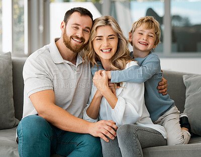 Buy stock photo Love, hug and child with property, happy family or house to relax with security, safety and care. Smile, investment or proud parents on couch with boy, support and trust for bonding together in home