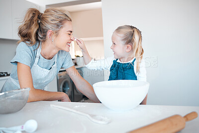 Buy stock photo Kitchen cooking, mother and playful kid baking, happy and help prepare butter, flour or food ingredients. Mama, love and family fun or woman bonding with daughter, child development support and home