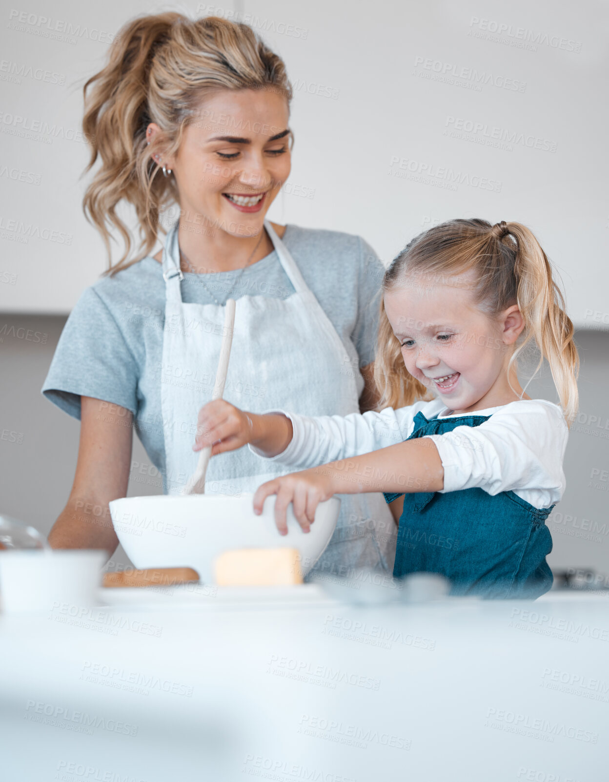 Buy stock photo Kitchen baking, mother and smiling kid cooking, happy and help prepare butter, flour or food ingredients. Mama, love and family fun or woman bonding with daughter, child development support and home