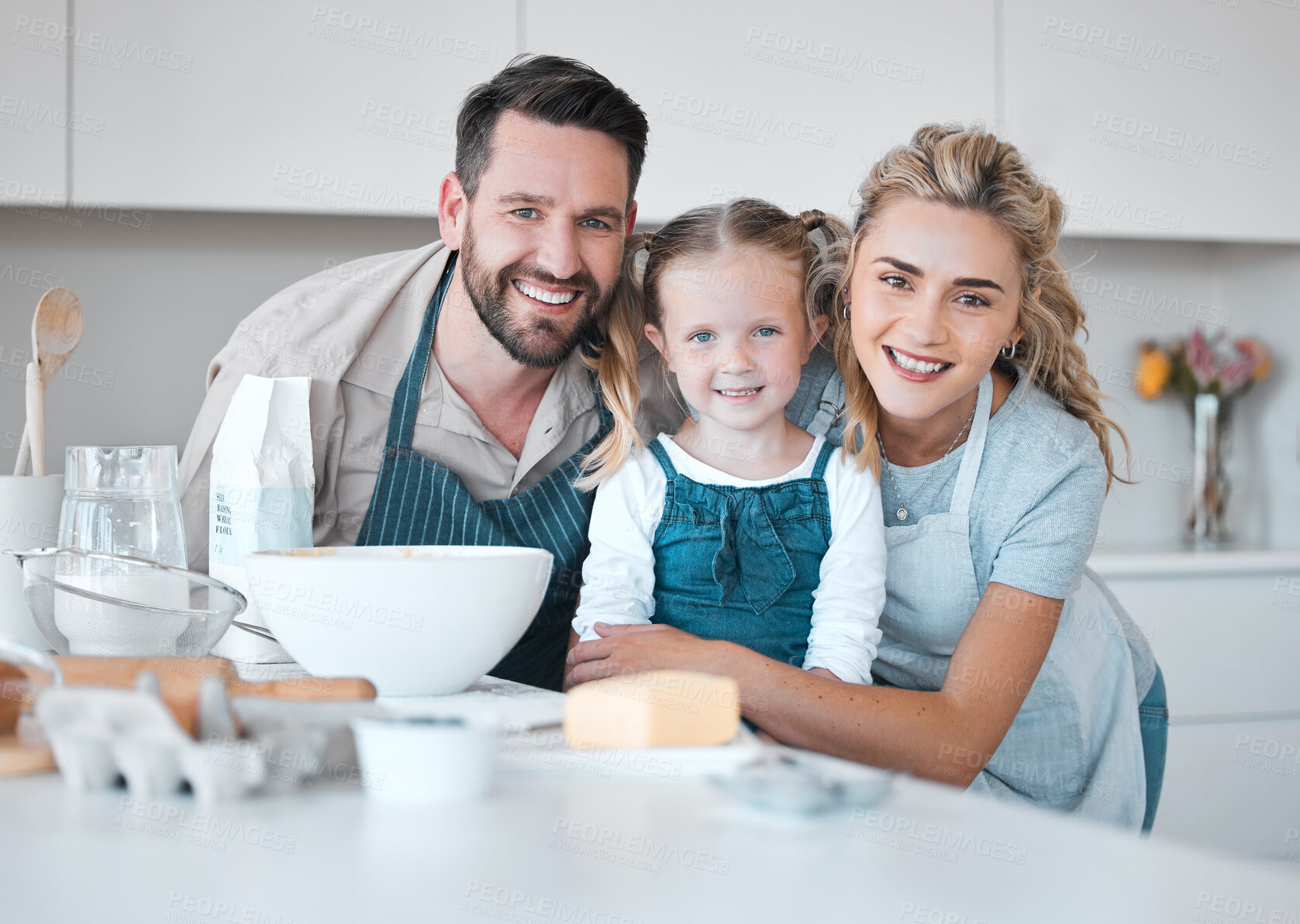 Buy stock photo Kitchen baking, family portrait and girl cooking, happy and help prepare milk, flour or food ingredients. Parents, love and fun or mother bonding with father, daughter development, support and home