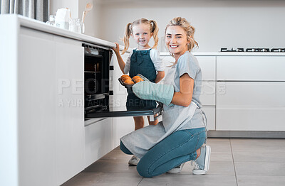 Buy stock photo Kitchen baking, mother and daughter portrait cooking, happy and tray for muffins, cupcakes or sweet food. Mama, love and family fun or woman bonding with kid, child development support and home