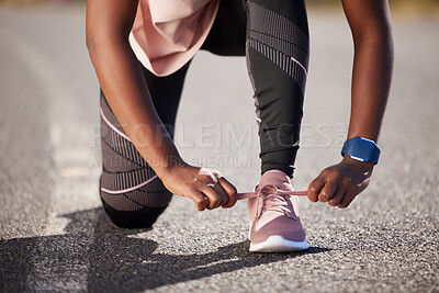 Buy stock photo Person, shoes and tying with laces on road for fitness, running or outdoor exercise on asphalt. Closeup of active runner tie sneakers in preparation or getting ready for workout, sprint or training