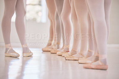 Buy stock photo Feet, ballet and dance class with studio teacher and student group for performance and training. Ballerina, teaching and legs with routine learning and practice with toe shoes of dancer in line