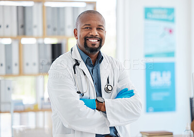 Buy stock photo Portrait, doctor smile and black man with arms crossed, pride for career, occupation or job in clinic. Healthcare, mature person and happiness, proud and confident medical professional from Nigeria.