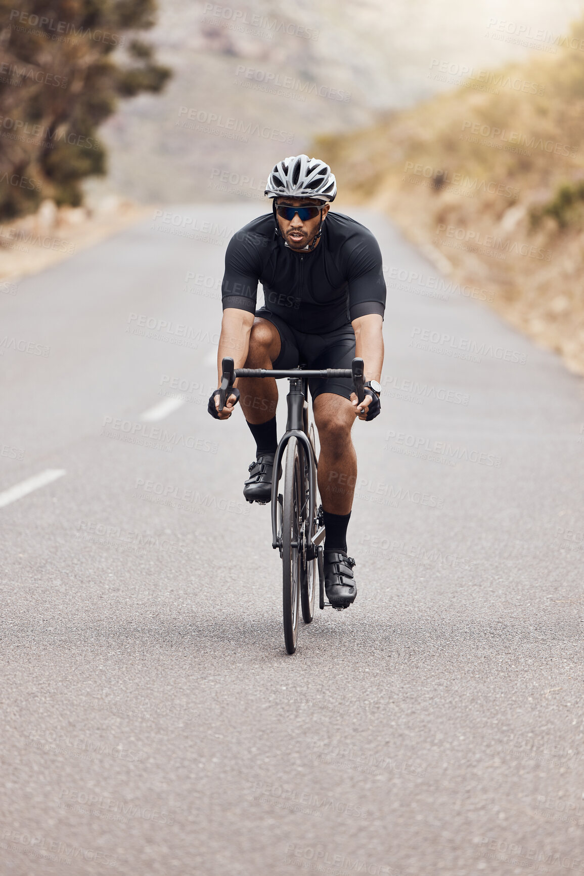 Buy stock photo Man, fitness and cyclist with bike on mountain road for workout, exercise or outdoor cardio. Active male person, athlete or biker with helmet on bicycle for cycling, sports or training in nature