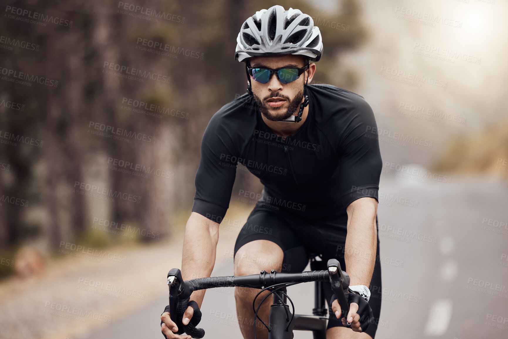 Buy stock photo Road, cyclist or man in portrait for fitness, competition and cycling race with endurance in Germany. Outdoor, male athlete and helmet for safety, physical wellness and bike for sports adventure