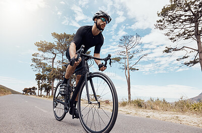 Buy stock photo Road, cyclist or man in speed for training, competition and cycling race with endurance in Denmark. Outdoor, athlete and helmet for safety, fitness wellness and bike for sports adventure with energy