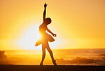 Silhouette of a young ballet dancer on the beach at sunset. Graceful slender ballerina dancing with passion and stretching out her hand 