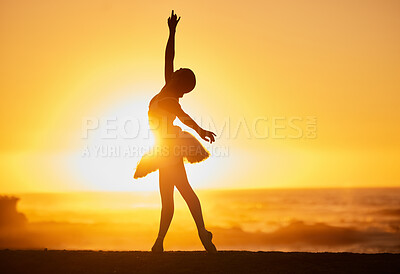 Buy stock photo Ballet, sunset and silhouette at beach for freedom, creative and dance with energy, water and balance. Ballerina, person and fitness outdoor by ocean for aesthetic, performance and exercise as artist