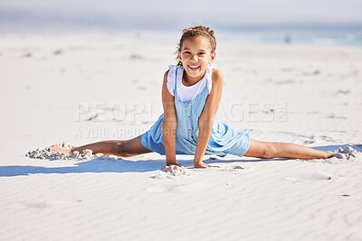 Buy stock photo Happy, girl and portrait on sand by beach on summer vacation for travel on spring break with adventure or journey. Female child, smile and playful on shore for outdoor fun, holiday and seaside.