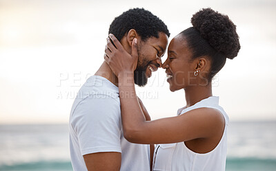 Buy stock photo Sunset, black couple and smile with romance, beach and celebrating together for anniversary. Vacation, honeymoon and people relax with love, travel and marriage on summer holiday and Miami ocean