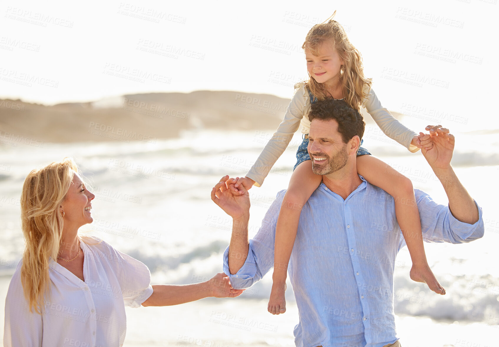 Buy stock photo Travel, happy parents and child on beach with bonding on vacation, summer holiday and support with love. Family, people and smile on weekend trip at ocean, seaside or outdoor in nature with security