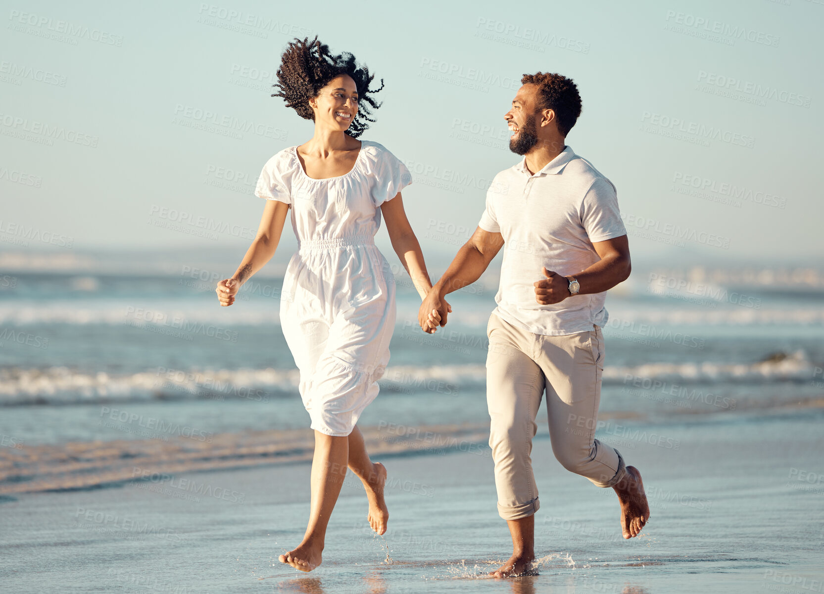 Buy stock photo Couple, holding hands and running on beach with love for travel journey, care and bonding on marriage date by ocean. Relax, woman and man with support, trust and morning on vacation for peace outdoor