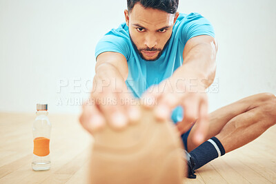 Buy stock photo Stretching, fitness and man in court, game and active for playing in sports, training and practice. Serious, sportsman and confident of tournament, squash player and exercise of person and athlete