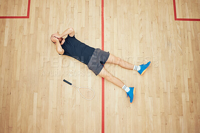 Buy stock photo Floor, sad and man in court, game and disappointment for playing in sports, training and practice. Racket, athlete and performance fail in tournament, squash player and cover of face with hands