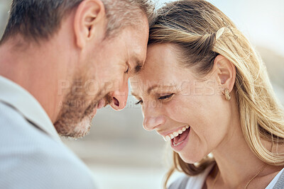 Buy stock photo Forehead touch, couple and happy for outdoor date, romantic time and bonding together for loyalty. Wife, husband and love smile in nature with marriage commitment, anniversary vacation and support