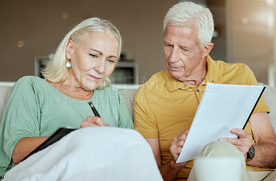 Buy stock photo Mature couple, home and savings with paperwork for house finance, budget and retirement plan. People, relationship and sofa in living room with documents or contract for life policy or insurance