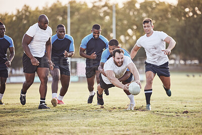 Buy stock photo Rugby, man and diving with ball for score or win touchdown with a try, tackle and competitive sports or game. Team, athlete and field for football or running for championship tournament and match.