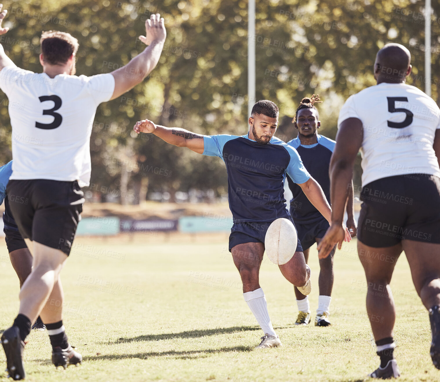 Buy stock photo Sports, drop goal and rugby team on field for training, match or skill development for try. Fitness, defense and player kick ball for scoring penalty at practice, game or tournament with opponent.