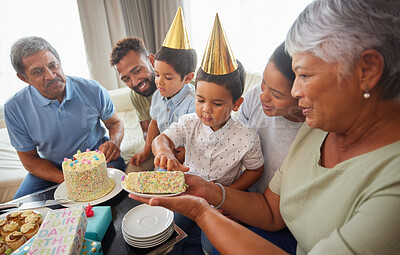 Buy stock photo Family, eating and birthday cake with relax on sofa for bonding, support and people at fun home party. Grandparents, parents and children for growth, celebration and happy with gift in living room