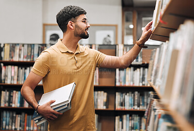 Buy stock photo Student man, search bookshelf and library for reading, information and knowledge at university. College student, research and studying for education, college and learning for scholarship in Marseille