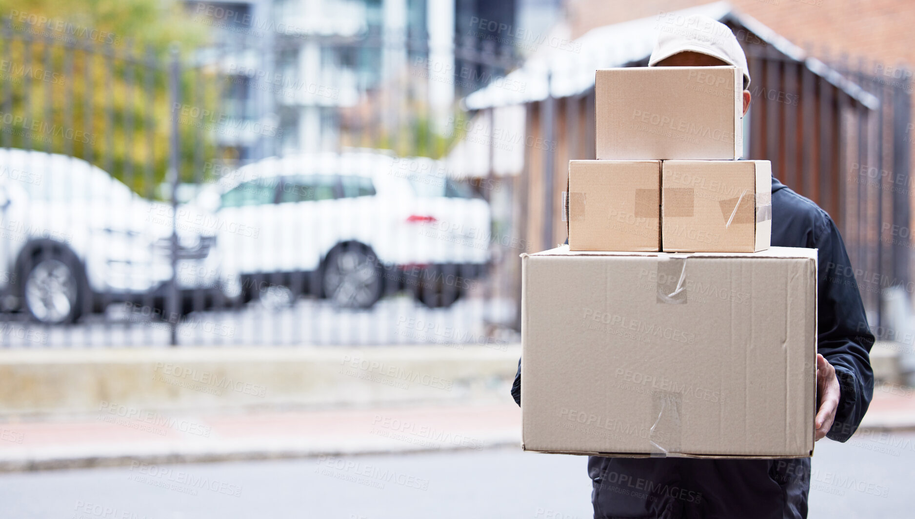 Buy stock photo Courier person, street and walking with boxes, service and delivery in urban city for supply chain job. Logistics worker, package and road for customer satisfaction, product and commerce in metro cbd