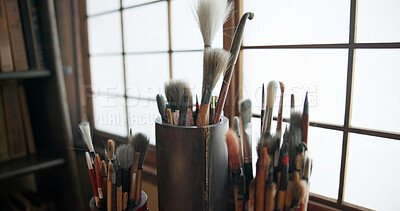 Buy stock photo Paint brush, equipment and supplies in empty studio closeup for art, creative or talent showcase. Workshop interior or room with still life objects for artistic creativity or artwork drawing