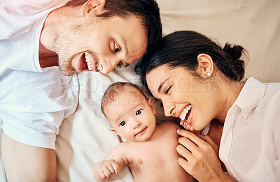 Buy stock photo Mom, dad and baby in bedroom above for mothers day with love, house bonding with support or care. Happy family, people and together in home for wellness with smile, calm peace and relax in apartment