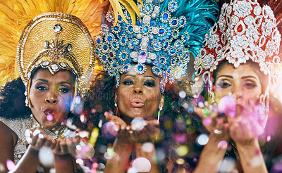 Buy stock photo Carnival, confetti and portrait of women in Brazil with costume, blowing kiss and party in city. Festival, show girls and glitter at parade for celebration, culture and traditional samba dancers 