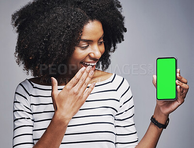 Buy stock photo Businesswoman, smile and surprised with phone in green screen for advertising company website and discount deal. Happy, person and smartphone with mockup space for promotion news on studio background