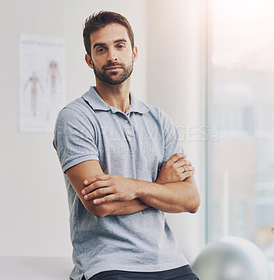 Buy stock photo Portrait, man and physiotherapist with arms crossed in medical clinic for health, recovery or rehabilitation. Face, confidence and physical therapist, professional or chiropractor with pride in Spain