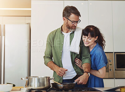 Buy stock photo Stove, happy and couple with cooking in kitchen for nutrition, healthy diet and bonding together. Man, pan and love of woman with hug in marriage for partnership, meal prep and dinner date at home