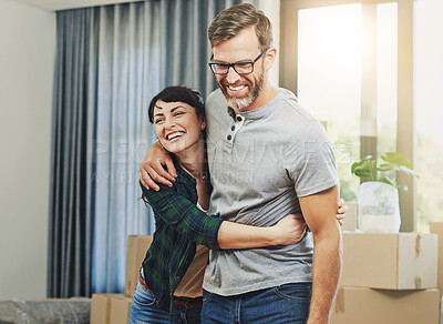 Buy stock photo Hug, moving and couple in new home with boxes for immigration together in Canada with marriage. Happy, cardboard and mature man and woman embrace for achievement of mortgage with property investment.