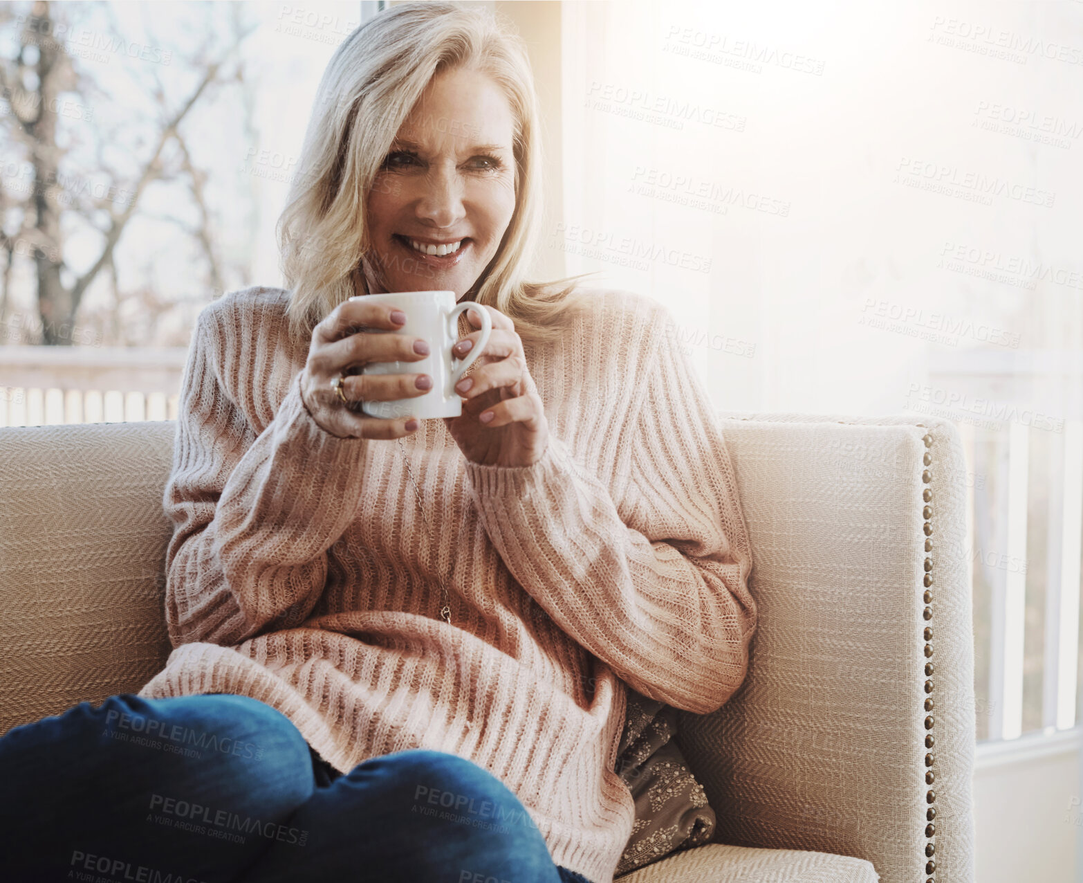 Buy stock photo Smile, coffee and senior woman on sofa relax in home with positive thinking, reflection or memory. Happy, calm and mature female person drink cappuccino in living room for peaceful morning in house.