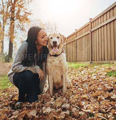 Buy stock photo Woman, dog and portrait outdoor in autumn season for wellness, love and walking pet with happiness. Female person, labrador and smile on garden lawn for animal welfare, bonding and puppy training