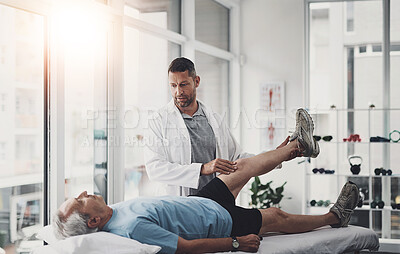 Buy stock photo Senior man, physiotherapy and leg with stretching for join recovery, support and rehabilitation. Bed, consultation and patient with exercise in help for knee pain, inflammation and joint strength