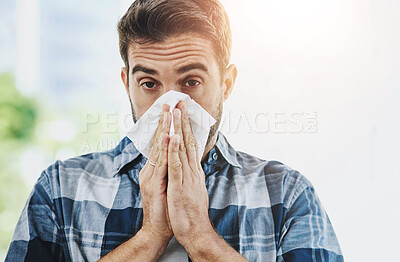 Buy stock photo Sick, tissue and portrait of man blowing nose in city for health, wellness and relief for congestion. Male person, illness and outside in spring with allergies, virus infection and reaction to pollen