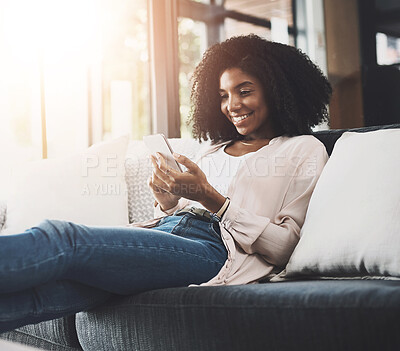 Buy stock photo Black woman, couch or reading with phone for internet news or relax, email or blog for ideas. Female person, sofa or mobile with website for diy plan in home, scroll for information with app