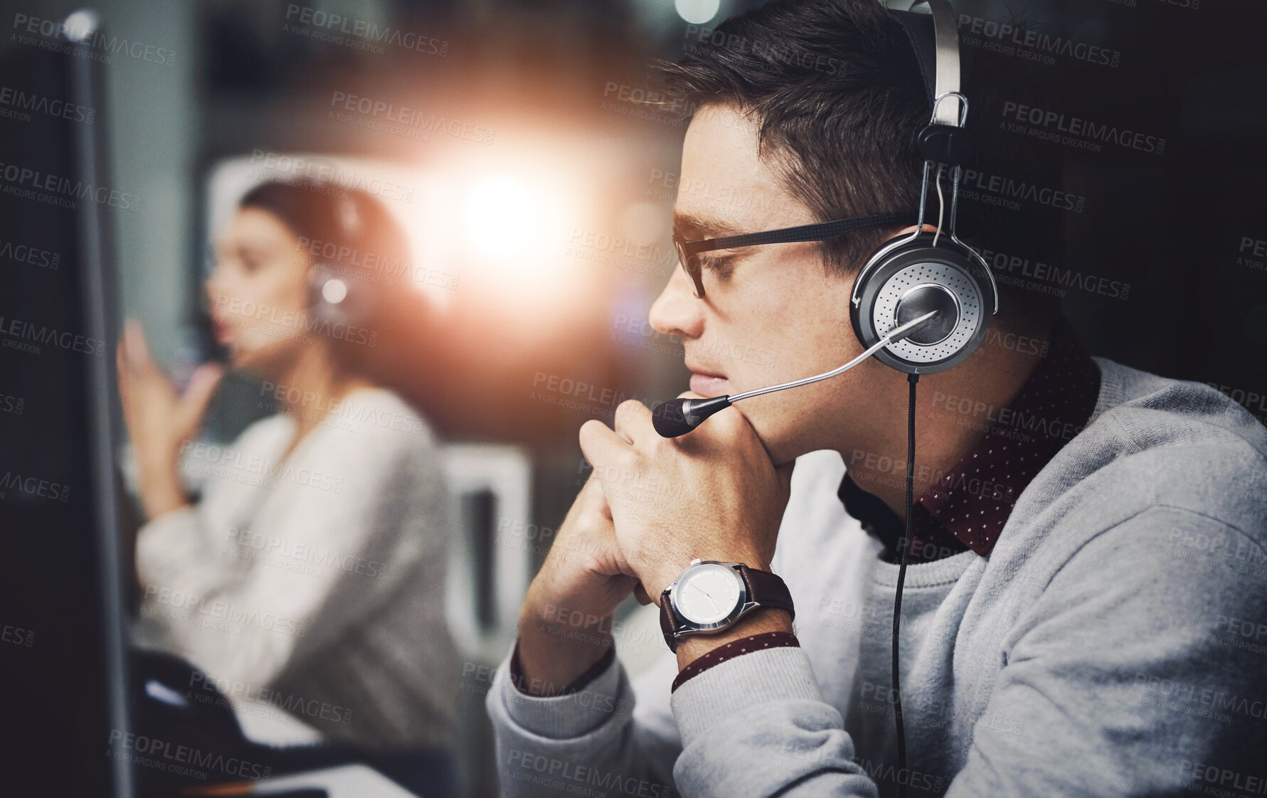 Buy stock photo Call center, man and consultant with microphone for customer service with communication and FAQ support. Telemarketing, agent and telecom advisory with headphones, contact us and assistance at night