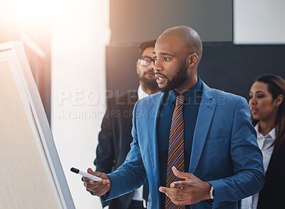 Buy stock photo Leader, business people and board for coaching in office with collaboration, executive with idea for company growth. Manager, training and staff in workplace listening to mentor, pitch with diversity